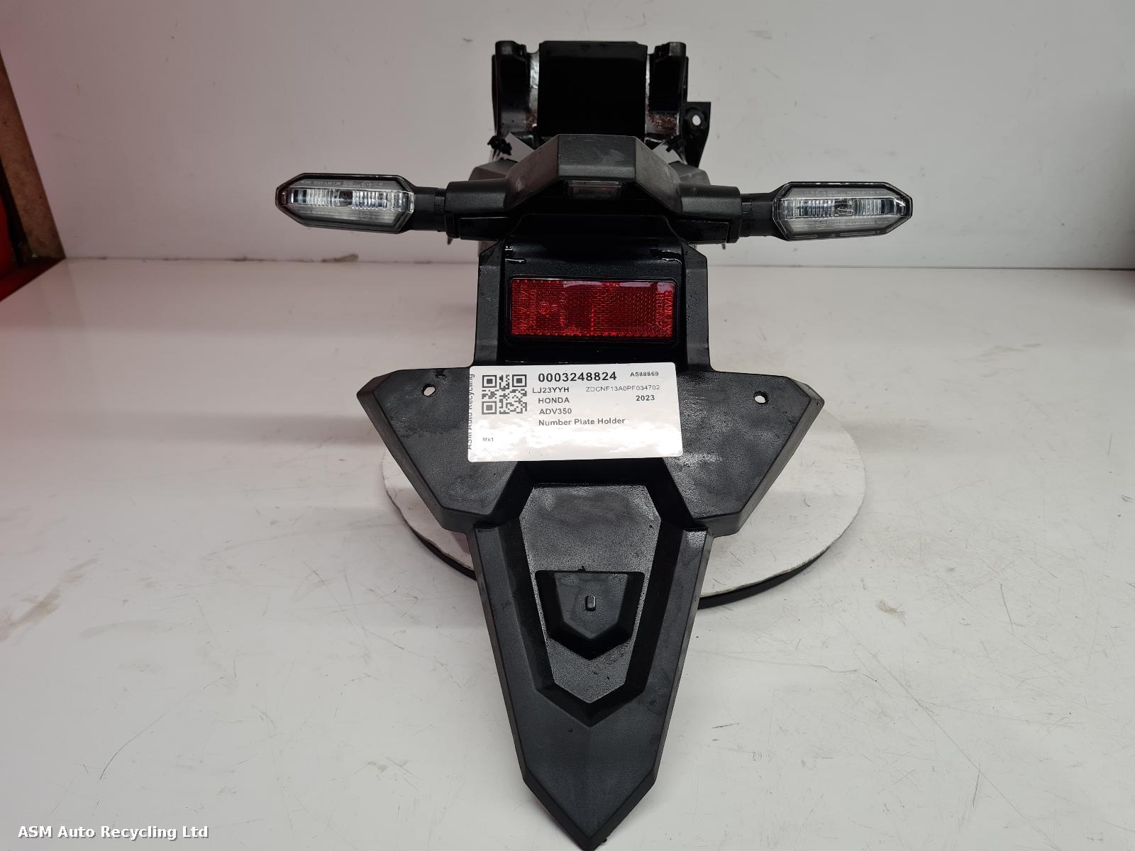 View Auto part Number Plate Holder Honda Adv350 2023