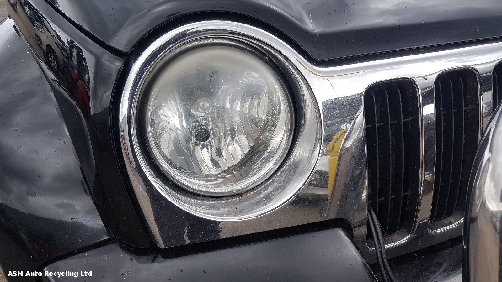 View Auto part R Headlamp Jeep Cherokee 2003